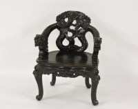 Lot 398 - A Chinese carved armchair