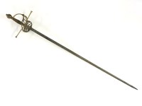 Lot 305 - A brass and engraved steel bladed sword. 106cm long