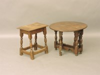 Lot 423 - An early 20th century elm topped joined stool