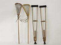 Lot 208 - A pair of old wooden crutches