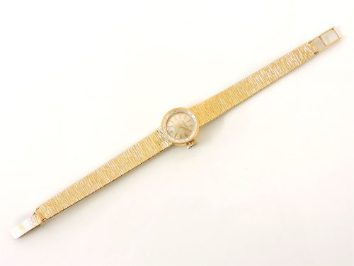 Lot 48 - A 9ct gold ladies Longines mechanical strap watch