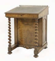 Lot 529 - A walnut davenport