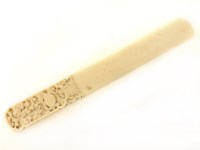 Lot 79 - A late 19th century Canton carved ivory page turner