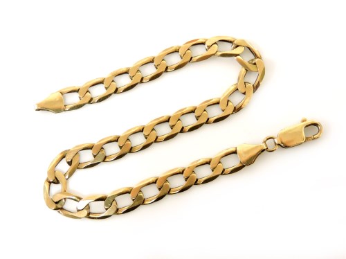 Lot 18 - A gold filed curb link bracelet