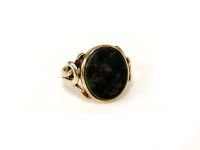 Lot 8 - A gold oval set bloodstone ring