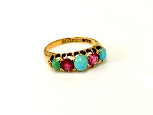 Lot 17 - An 18ct gold five stone turquoise and synthetic ruby ring