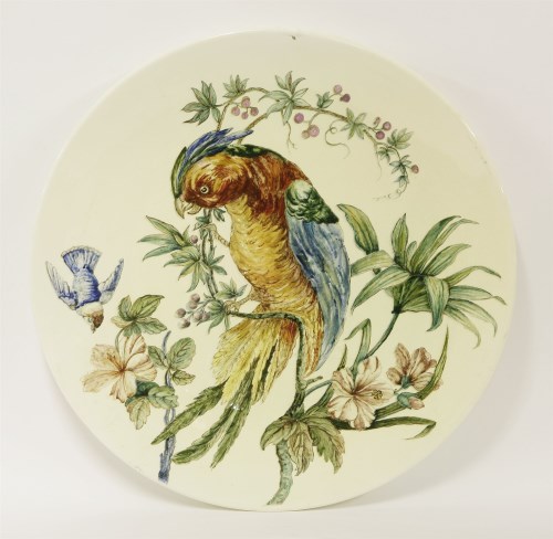 Lot 317 - A large French pottery hand-painted charger