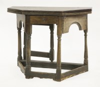 Lot 544 - An oak credence table