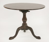 Lot 546 - A George III mahogany tripod table