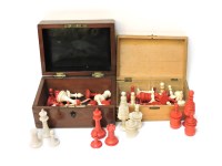 Lot 114 - Two late 19th century carved and turned bone chess sets