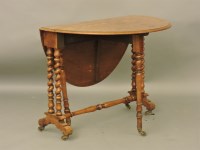 Lot 457 - A Victorian burr walnut Sutherland table