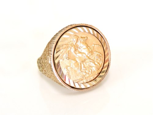 Lot 21 - A 1906 sovereign in a 9ct gold ring mount