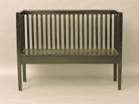 Lot 519 - An ebonised hall seat in the manner of the Wiener Werkstatte