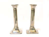 Lot 95 - A pair of silver candlesticks