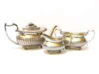 Lot 100 - A matched silver three piece tea set