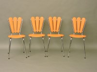 Lot 489 - Four French orange vinyl chairs