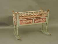 Lot 557 - A Scandinavian painted cradle