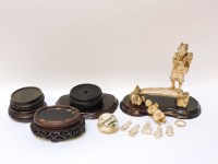Lot 1180 - A late 19th century Japanese walrus ivory group