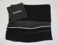 Lot 84 - A Chanel black silk chiffon evening scarf