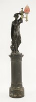 Lot 118 - A Regency bronzed plaster figural lamp and column