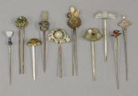 Lot 213 - A collection of nine Hairpins