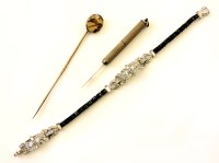 Lot 62 - A sterling silver tooth pick
