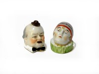 Lot 95 - Two German novelty china tape measures