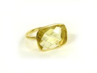 Lot 6 - A gold hammered chequer citrine ring