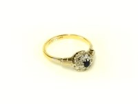 Lot 45 - An 18ct gold sapphire and diamond cluster ring