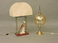 Lot 310 - A retro table lamp mounted with a porcelain parrot