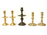 Lot 146 - A pair of Dutch Heemskerk brass candlesticks