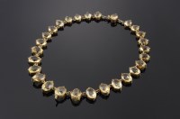 Lot 350 - An Edwardian graduated citrine rivière