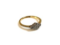 Lot 26 - An Art Deco gold lozenge shape diamond cluster ring