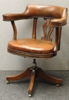 Lot 483 - An early 20th century Captain's chair