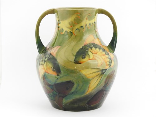 Lot 381 - A Moorcroft 'Carp' twin handled vase