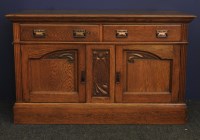 Lot 448 - An Arts and Crafts oak sideboard