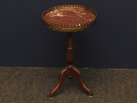 Lot 477 - A small French gilt metal mounted tripod occasional table