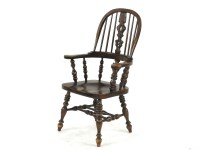 Lot 499 - An oak Windsor armchair