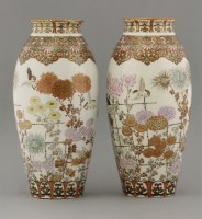 Lot 124 - A pair of Kutani Vases