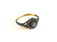Lot 13 - A Victorian silver diamond cluster ring