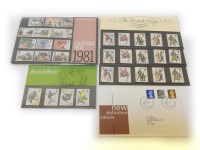 Lot 141 - A quantity of mint presentation pack stamps and albums of first day covers