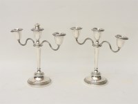 Lot 173 - A pair of modern silver candelabra
