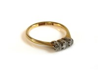 Lot 57 - A three stone diamond ring