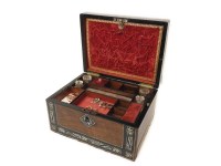 Lot 303 - A 19th century rosewood and inlaid toiletry box