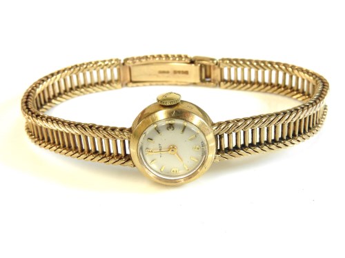 Lot 1 - A 9ct gold ladies Tissot mechanical bracelet watch