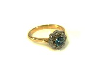 Lot 7 - An 18ct gold zircon and diamond cluster ring