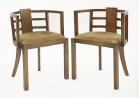 Lot 150 - A pair of Art Deco walnut elbow chairs