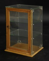 Lot 163 - A glass table top display cabinet