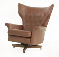 Lot 367 - A brown leather lounge chair