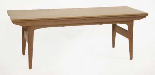 Lot 363 - A teak metamorphic coffee table